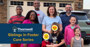 Group of eight people posing in front of a house; blue banner reads 'Thornwell Siblings in Foster Care Series' for a foster-care feature.